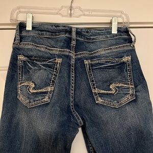 Silver Jeans Co. Suki Slim Boot denim. Size W27/L31